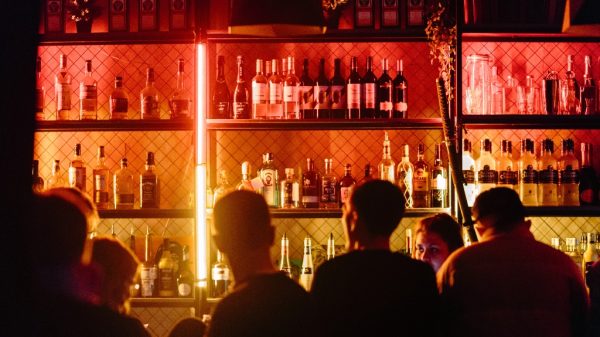 people at a bar representing good brand marketing