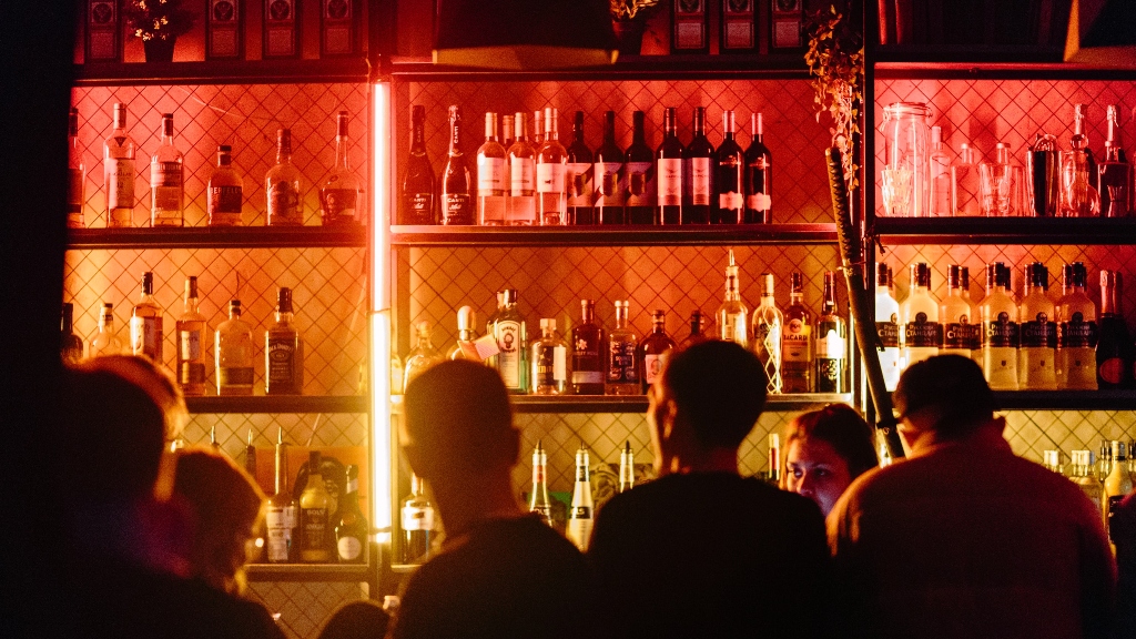 people at a bar representing good brand marketing