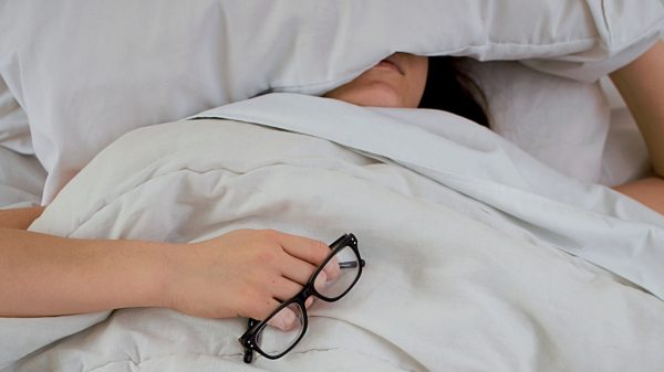 Person in bed in the morning