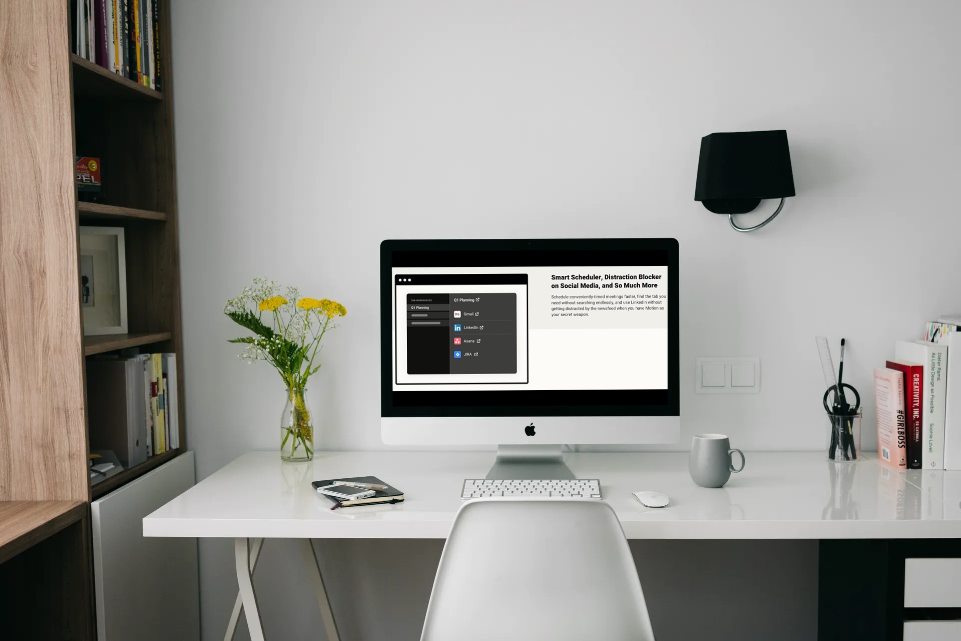 Motion the browser app open on a neatly organized white desk.