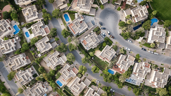 An aerial view of a residential neighborhood, the subject of changing home values.