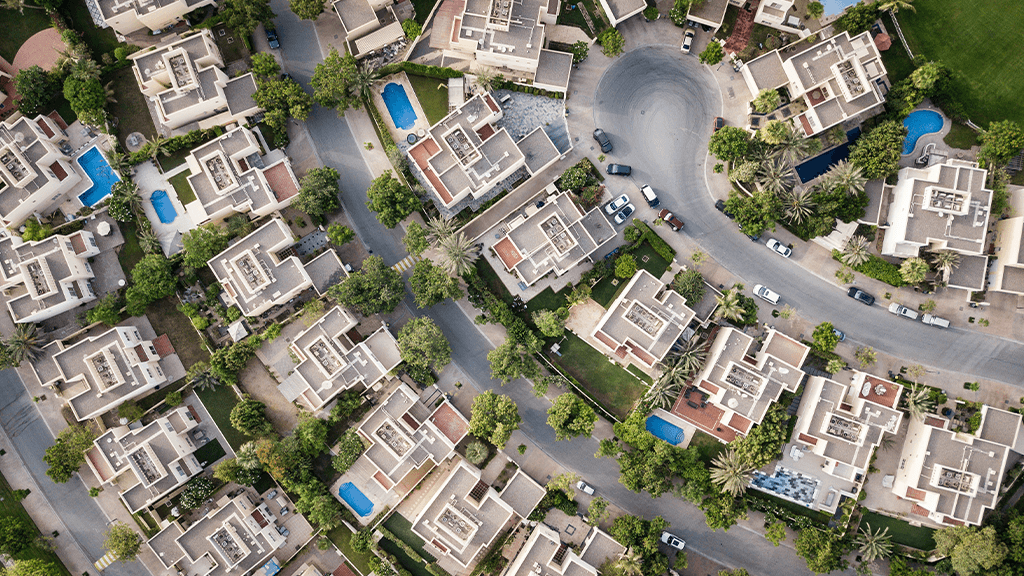 An aerial view of a residential neighborhood, the subject of changing home values.