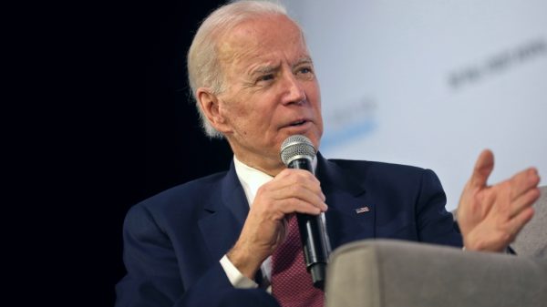 joe biden representing the federal reserve and inflation policies.