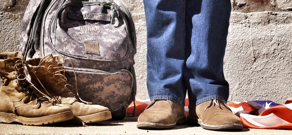 veteran with boots and backpack representing incoming inflation when looking for an apartment that tom hanks is apart of
