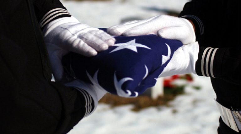 Woman fights eviction threats for displaying American flag