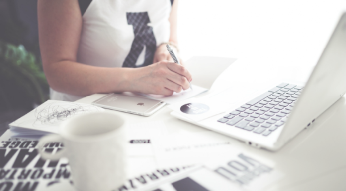 woman working laptop sheets
