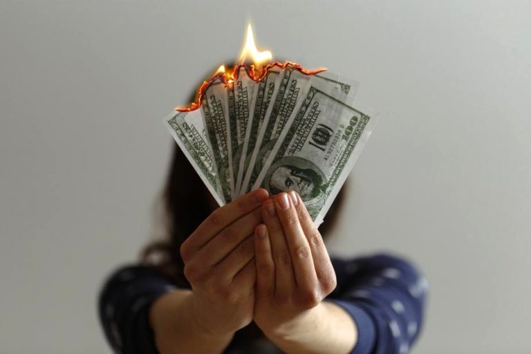 Burning money representing inflation