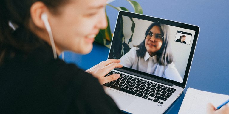 Two women in a Zoom meeting representing mentors.