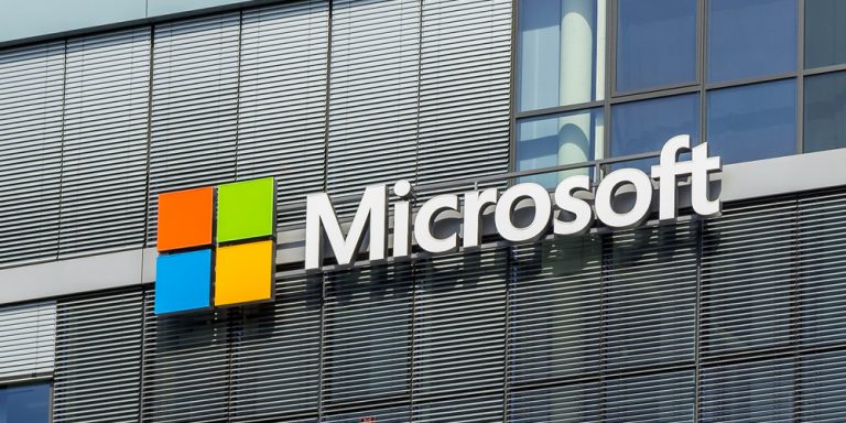 The front of the Microsoft office with large Microsoft logo.