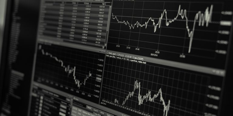 Black and white data screens monitoring productivity.