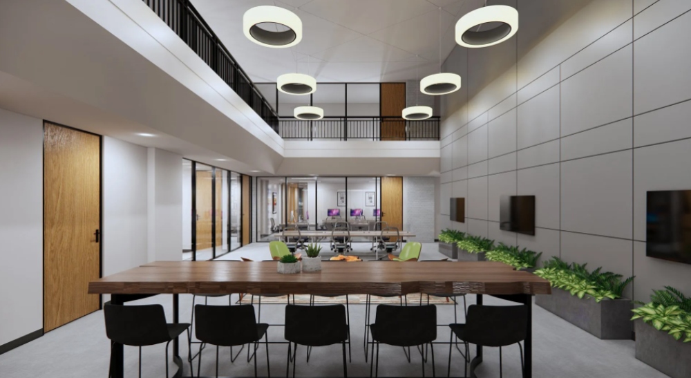 Two story dining or conference area in the workspace.