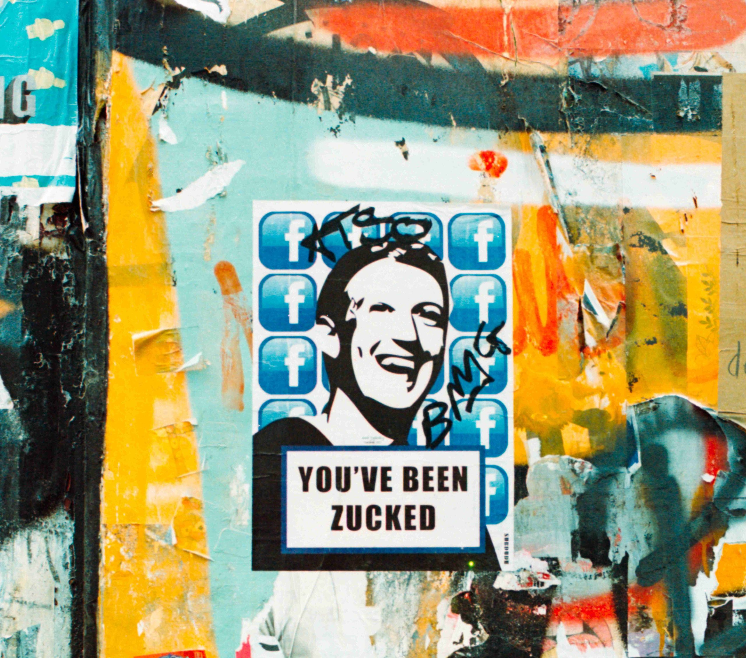 Graffiti wall with image of Facebook founder, Mark Zuckerberg, with the saying "You've been Zucked."