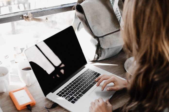 Woman typing on computer instead of writing.