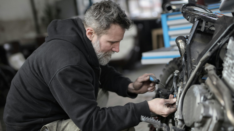 Auto company agrees to pay $325k to cancer patient they fired